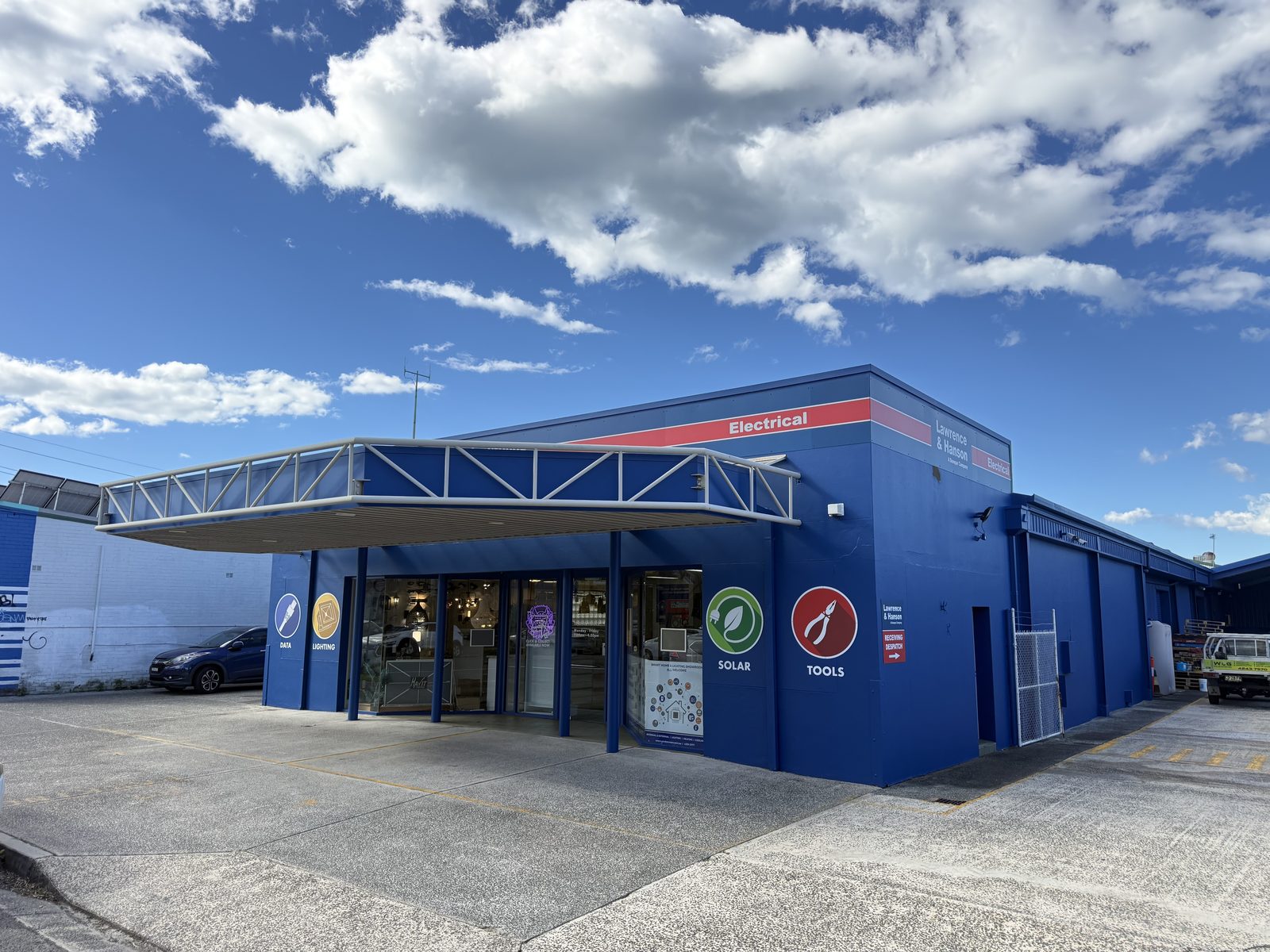 Repainted showroom frontage with product graphics