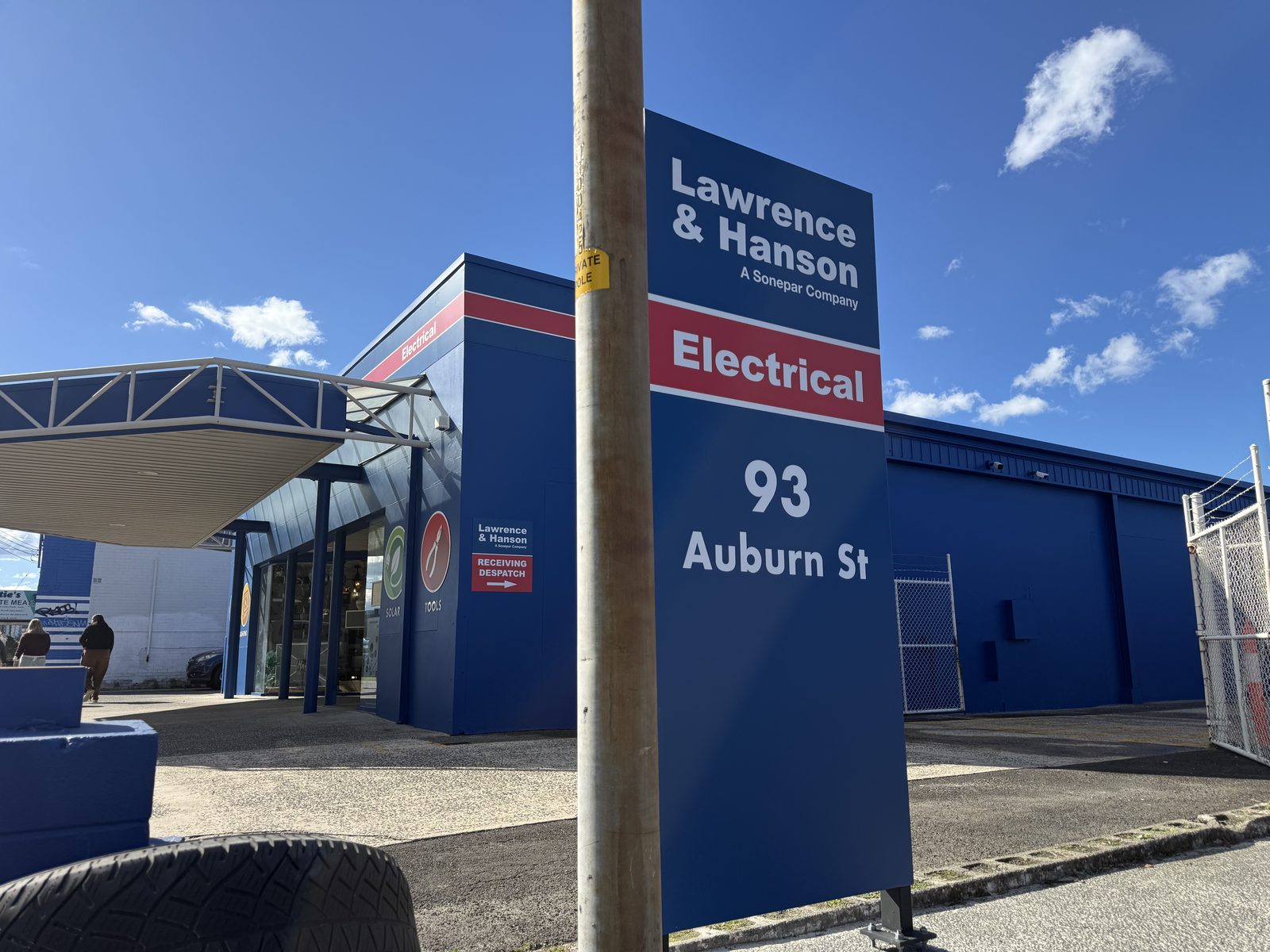 Pylon sign and repainted store at 93 Auburn St