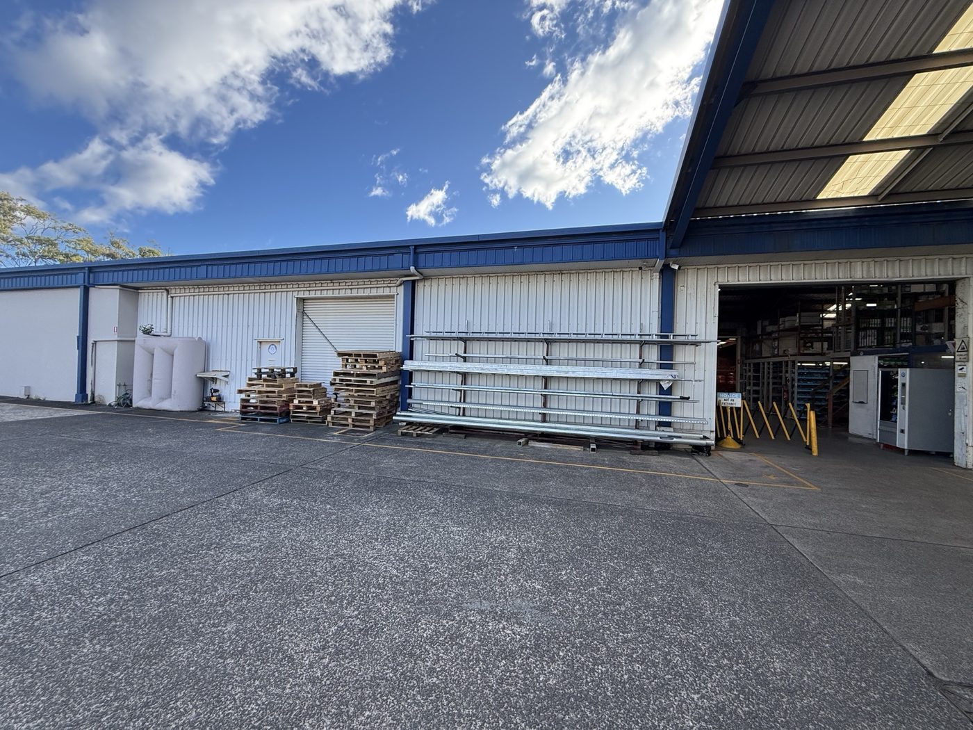 During — warehouse repaint in progress around live operations