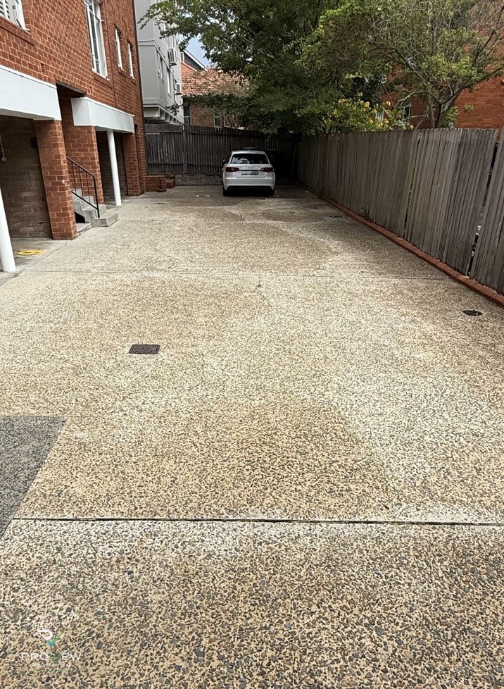 After — the same driveway pressure washed back to clean aggregate