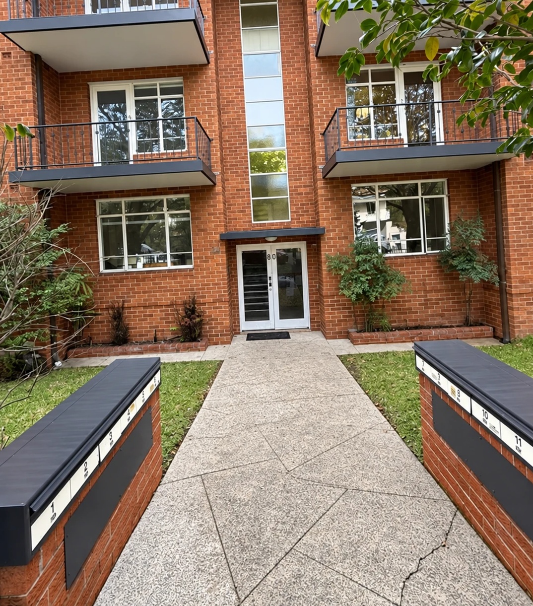 After — balconies, fascias and mailboxes repainted in Monument